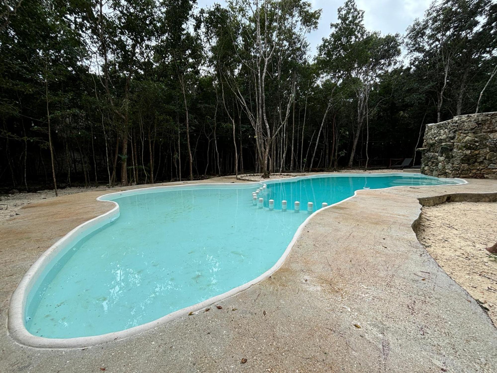 Aldea Maya-Ha Cabanas Con Cenotes Puerto Morelos Exterior photo