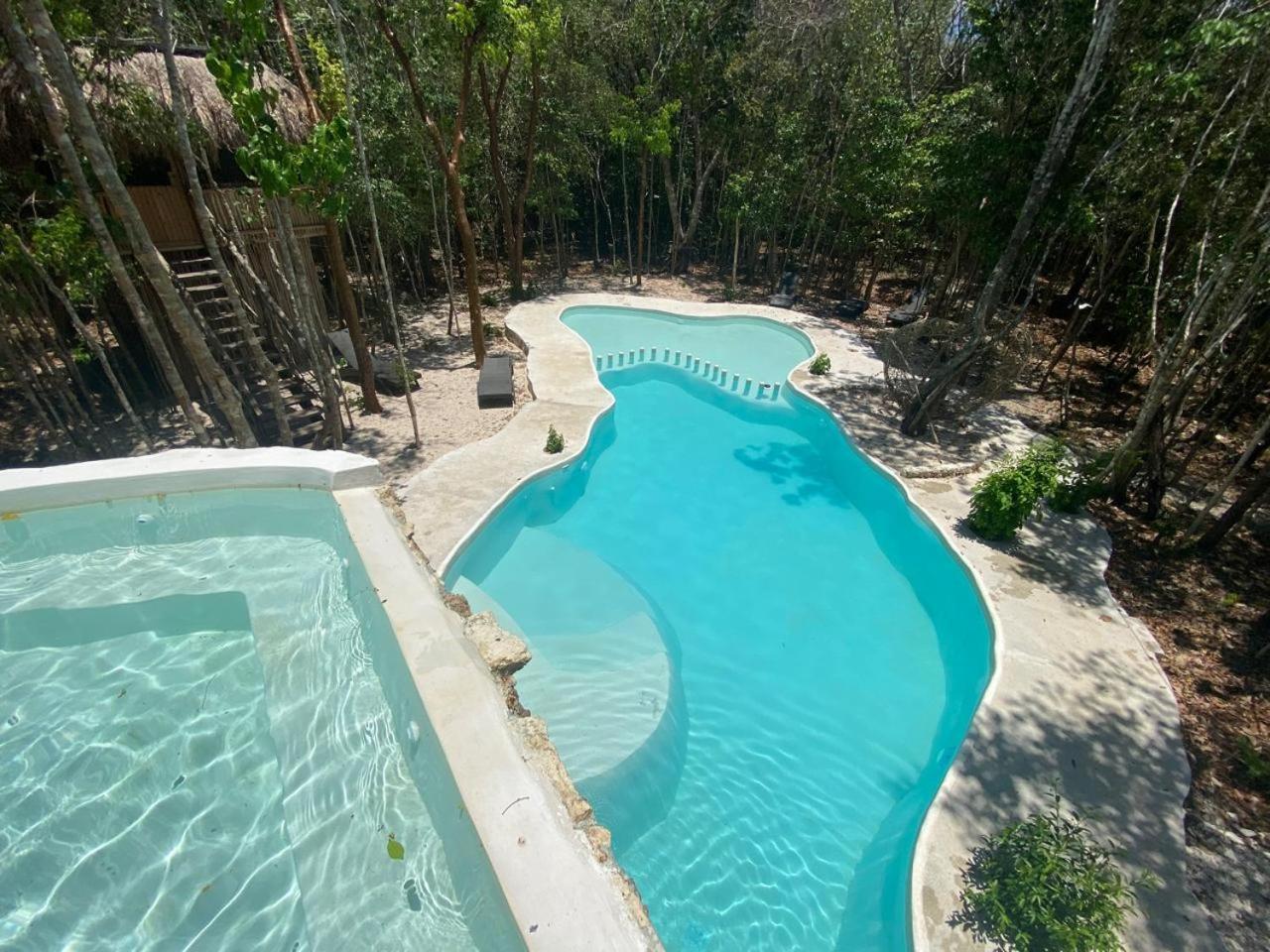 Aldea Maya-Ha Cabanas Con Cenotes Puerto Morelos Exterior photo